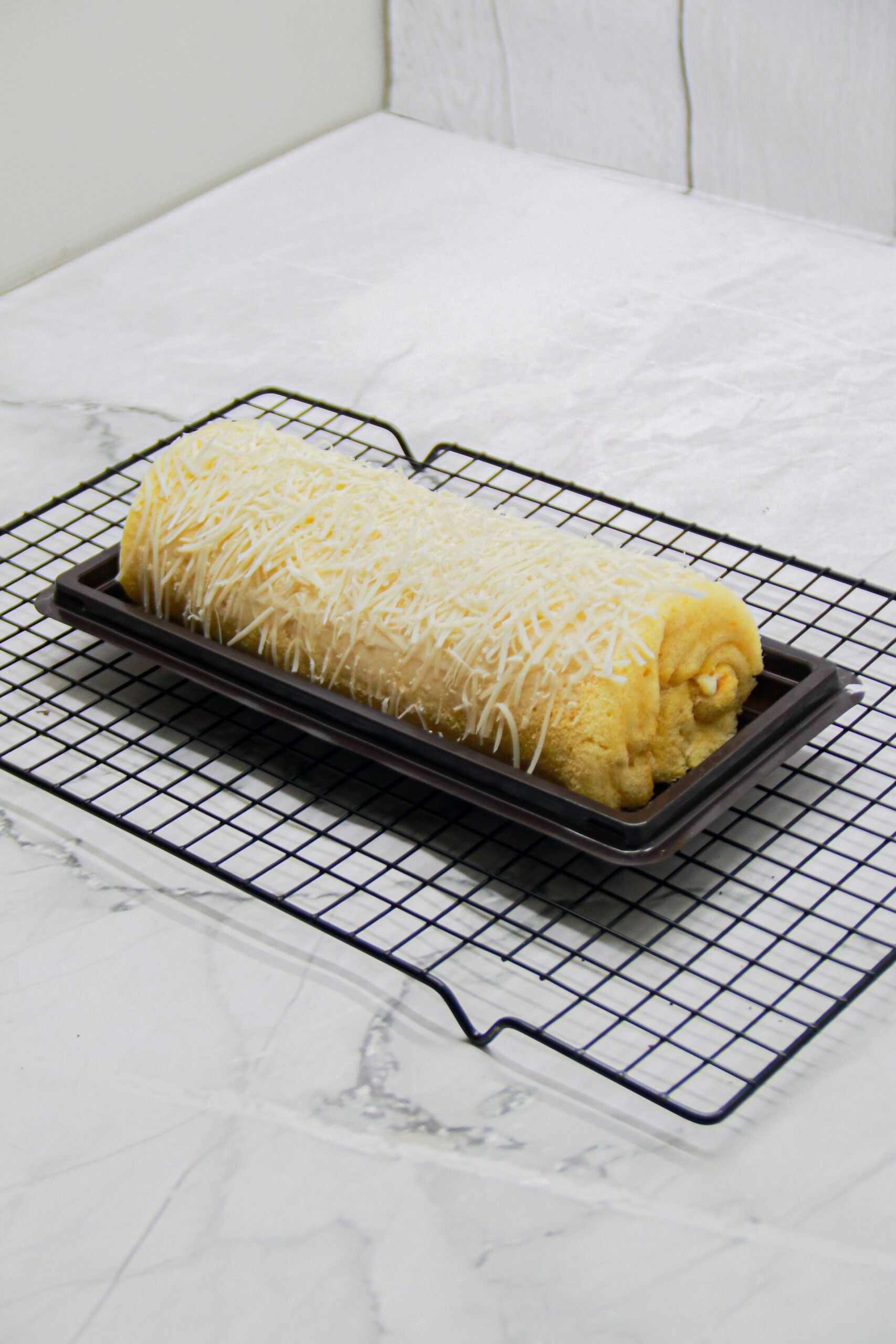 Bolu Gulung Cheesy Roll by Jasira Cakery