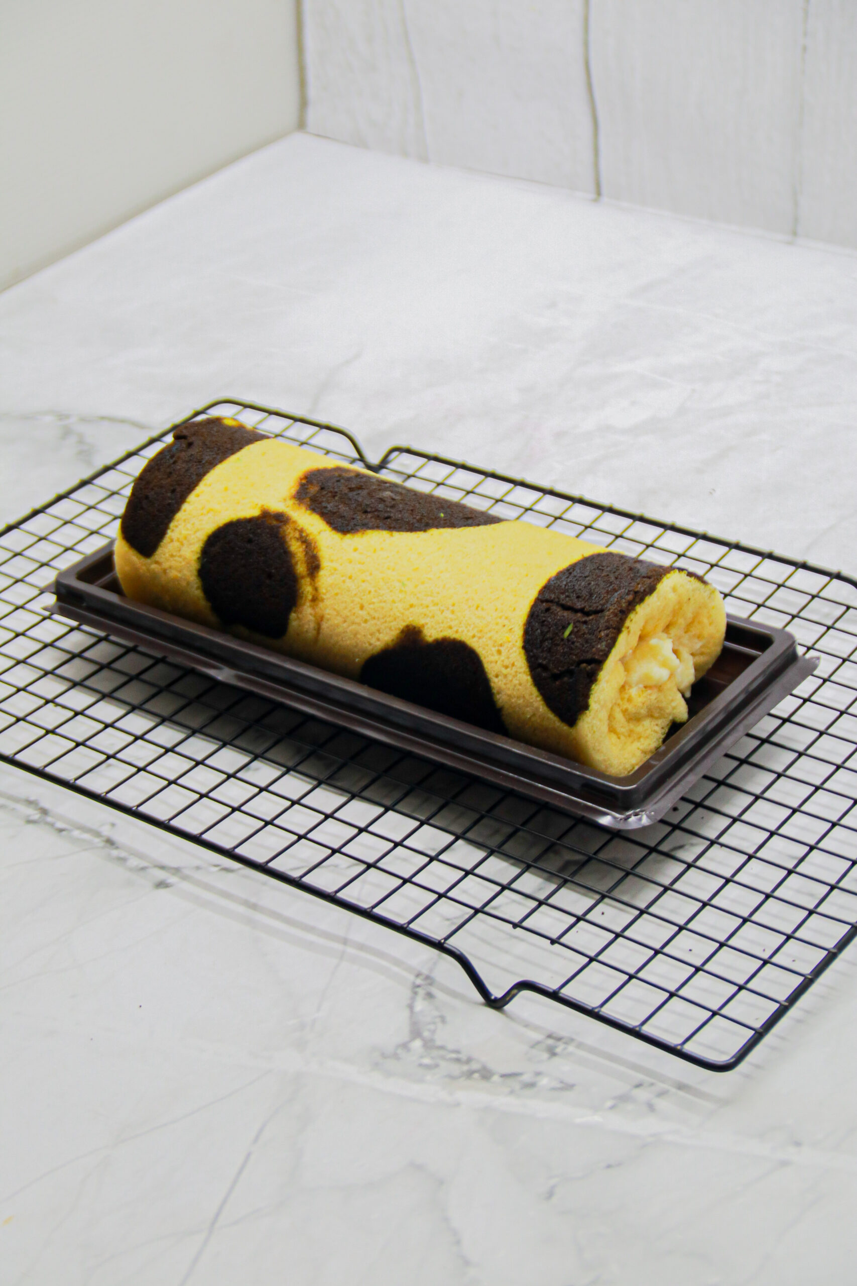 Bolu Gulung Momo Cheesy by Jasira Cakery