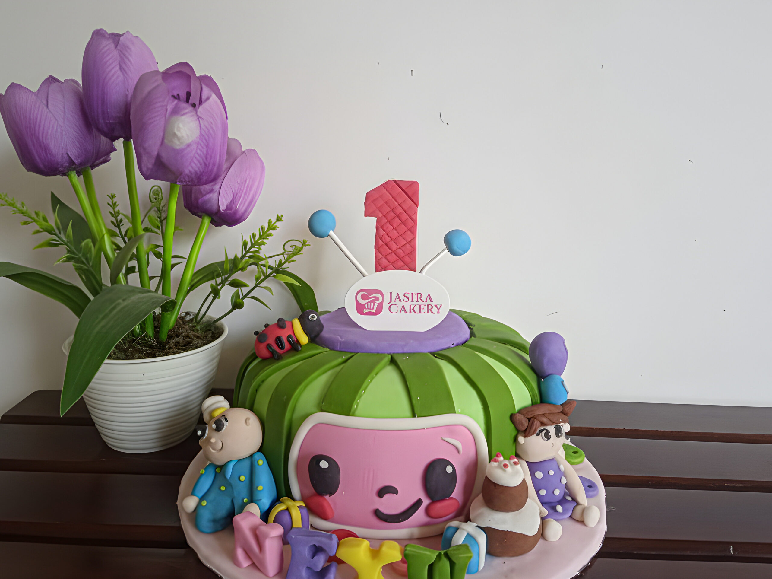 Custom Cake Fondant Tema Cocomelon by Jasira Cakery