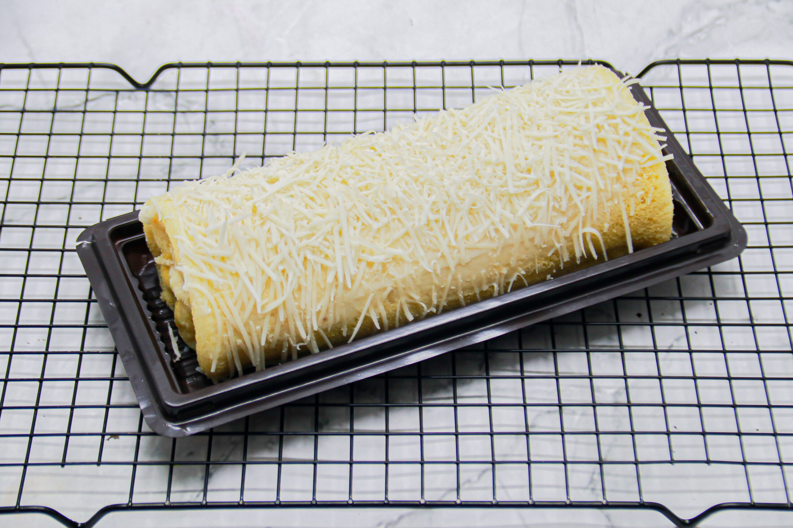 Bolu Gulung Cheesy Roll by Jasira Cakery - Image 3